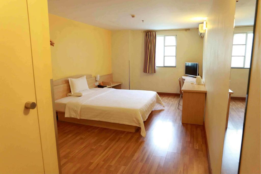 7Days Inn Luoyang Nanchang Road Wangfujing Номер фото