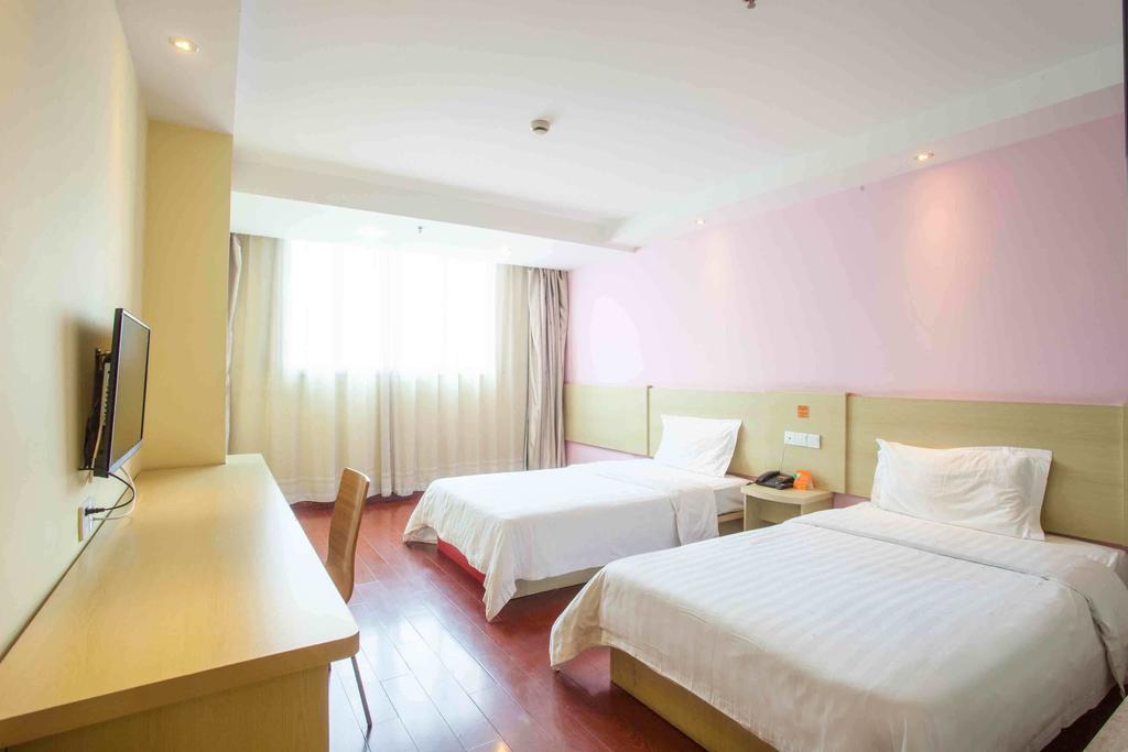 7Days Inn Luoyang Nanchang Road Wangfujing Номер фото