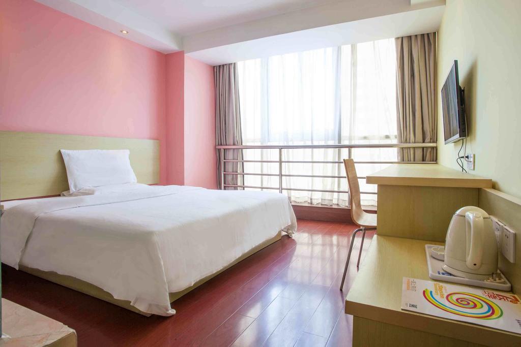 7Days Inn Luoyang Nanchang Road Wangfujing Номер фото