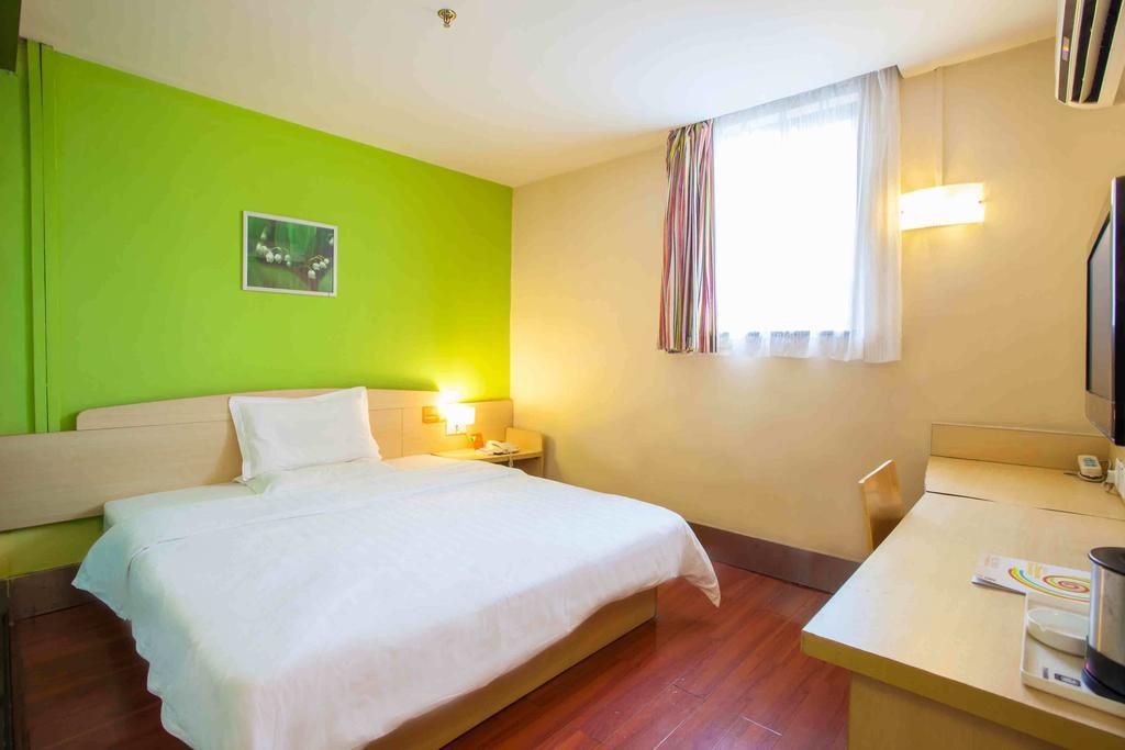 7Days Inn Luoyang Nanchang Road Wangfujing Номер фото